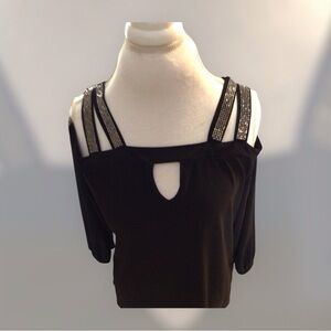 Super pretty party top. Got a little sparkle. Size XL